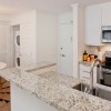 kitchen with stainless steel appliances and white cabinets
